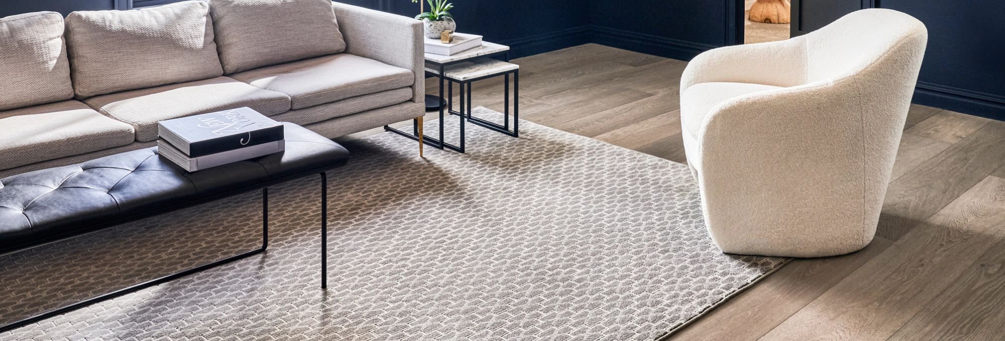 Living room with a sofa and a armchair from Choo Choo Carpets & Floor Coverings, Inc in Lane Chattanooga, TN