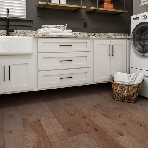 white bathroom cabinets and brown hardwood floor from Choo Carpets & Floor Coverings, Inc. in Chattanooga, TN