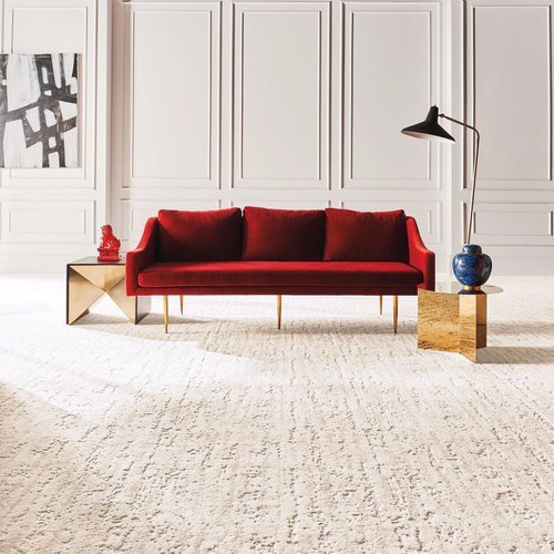 red sofa on a beige carpet from Choo Carpets & Floor Coverings, Inc. in Chattanooga, TN